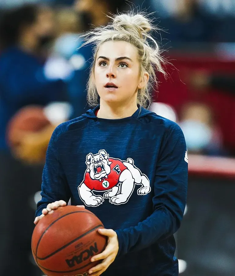 Haley taking a shot in basketball
