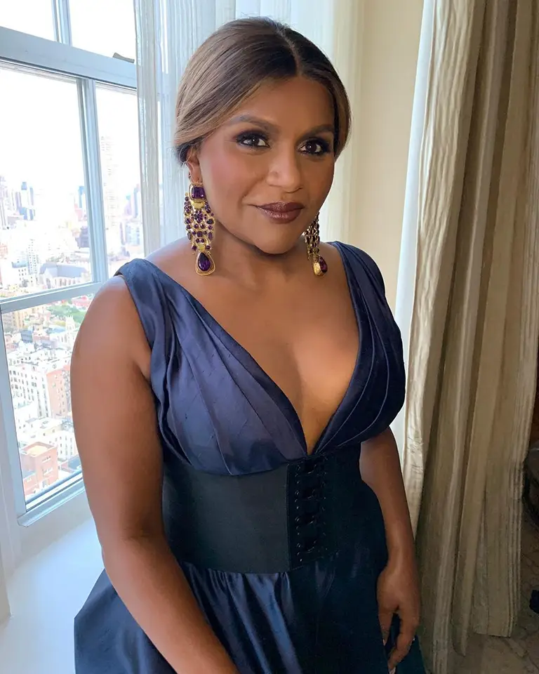 Posing In A Blue Dress By The Window
